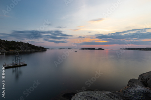 Wallpaper Mural Colourful sunset over the Baltic Sea and the Swedish archipelago near Gothenburg seen from the village of Vastra Frolunda, which is characterised by beautiful scenery, amazing shaped boulders and unto Torontodigital.ca