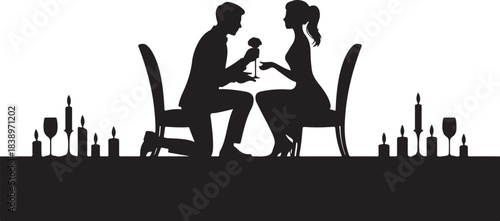 Man proposing marriage to woman at candlelit dinner