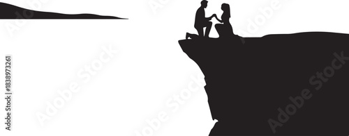 Man proposing to woman on cliff edge silhouette couple
