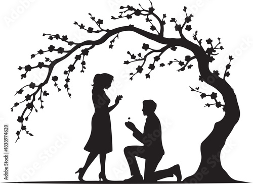 Man proposing to woman under flowering tree silhouette