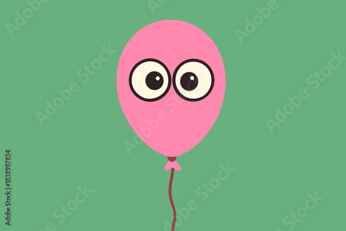 A pink balloon with eyes hanging against a green backdrop