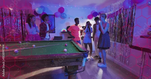 Group gathering pool table party, woman taking selfie, polka woman entering, group celebrating