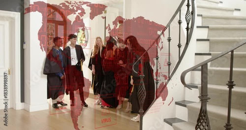 Grads entering door celebrating graduation, clustering in foyer, checking phone under red VIRUS map