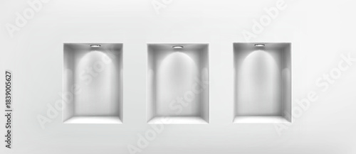 Empty white wall niches with led spotlights and shadow depth in 3d room interior. Blank shelf boxes illuminated by ceiling light for museum gallery exhibition or retail product display frame mockup.