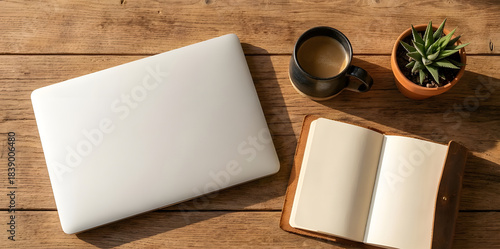 Cozy modern wooden workspace flat lay with laptop and coffee AI GENERATED