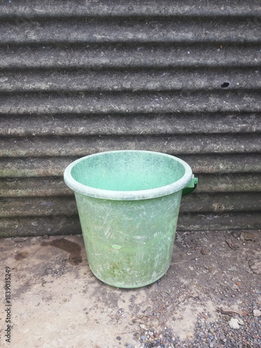 Old Green Plastic Bucket Outdoors – Rustic Utility Object