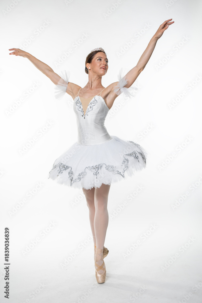 Naklejka premium Studio portrait of a ballerina in a white tutu