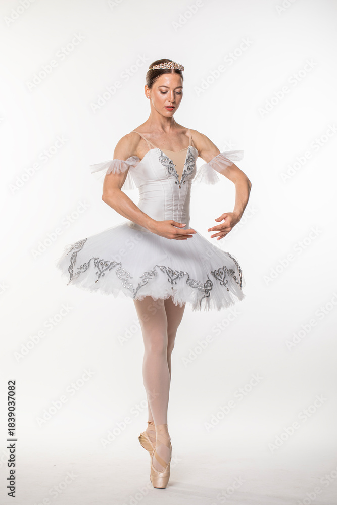 Naklejka premium Studio portrait of a ballerina in a white tutu