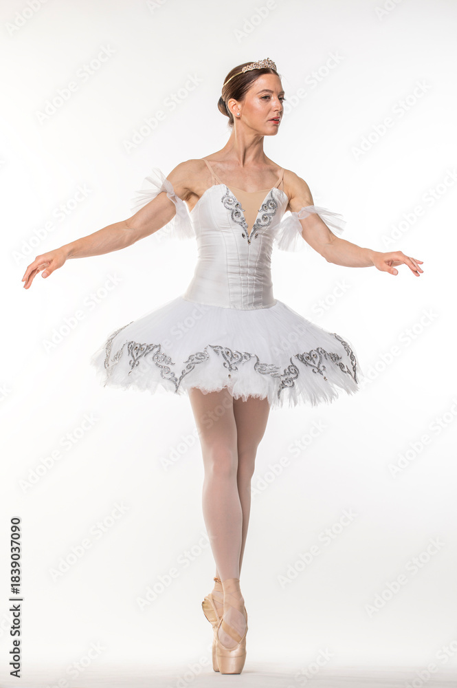 Naklejka premium Studio portrait of a ballerina in a white tutu