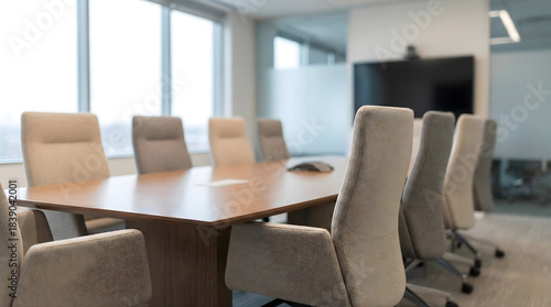 Empty modern conference room with wood table and chairs meeting room office
