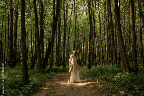 Beautiful nymph in a fairy forest