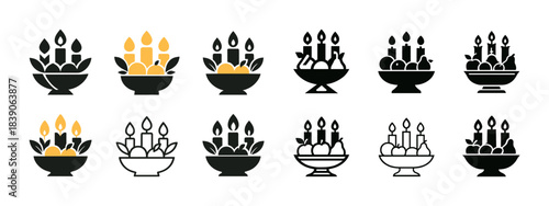 Candle and fruit bowl silhouettes - decorative icon set with yellow accents