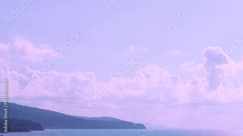 Lilac Sunset on the Seashore, Sea, Mountains, Colorful Sky, Puffy Clouds, Sun, Sunlight, Fast Time Lapse. Calm Ocean, Beautiful Evening Sky, Mountains, Clouds, Sun, Sea Water, Beach, Vacation, Island.