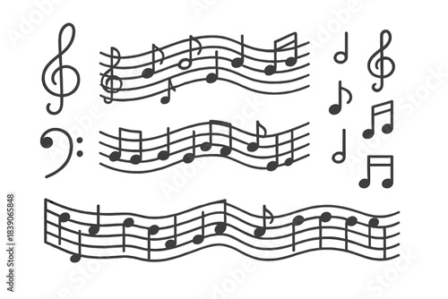 Various musical notation symbols including clefs and notes for composition