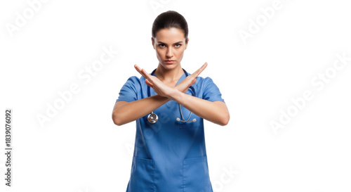 young caucasian female physician in royal blue scrubs, severe bun, crossing arms in a definitive prohibition gesture against a transparent, high-key studio background. concept of urgent medical