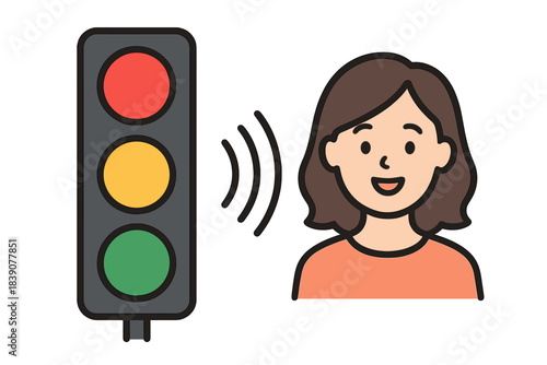 Woman receiving audio signal from traffic light for pedestrian crossing