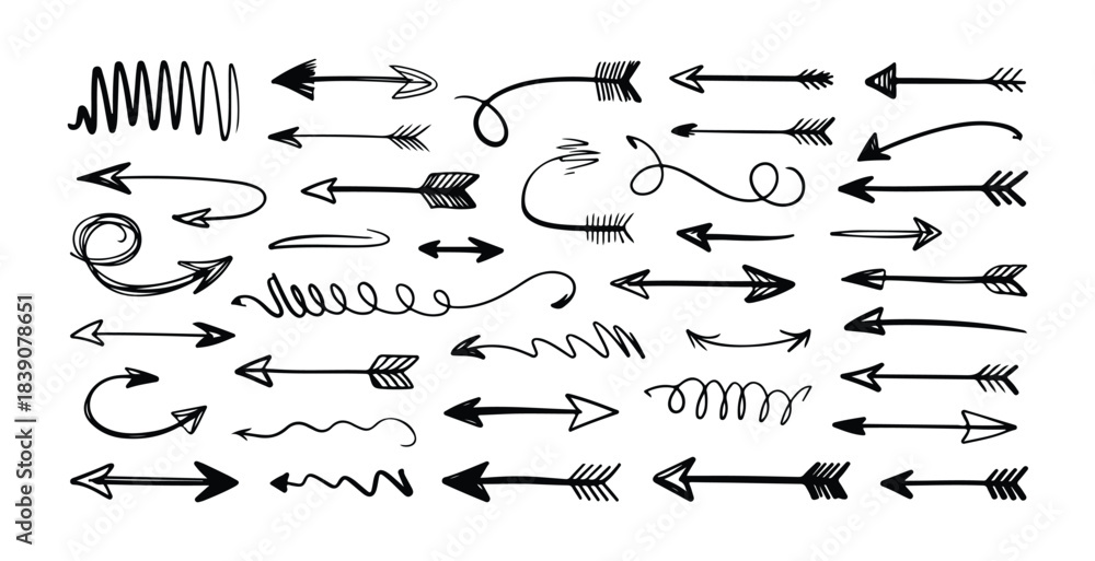 Fototapeta premium Set of diverse hand drawn arrows illustrating various directions movement and design elements for projects