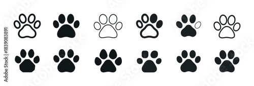 Variety of dog paw print designs in black and white illustrations