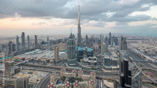 Dubai Downtown skyline futuristic cityscape with many skyscrapers and Burj Kh...