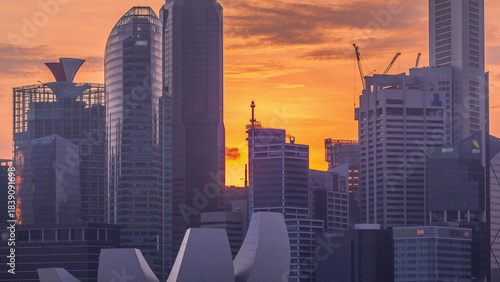 Sunset over the downtown skyline of Singapore as viewed from across the water...