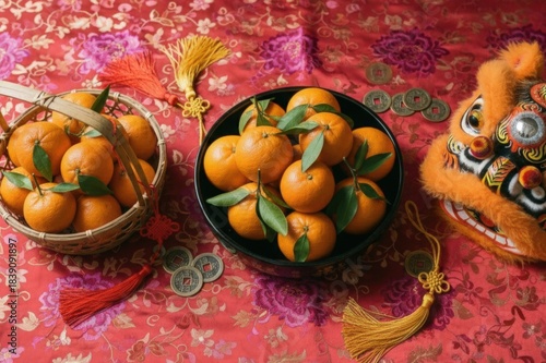 Vibrant display of fresh oranges in woven basket and black bowl, surrounded by festive decorations and traditional symbols, creating a joyful atmosphere for celebrations and cultural festivities