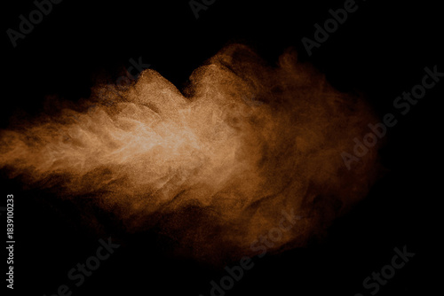 Sand dust, desert dust smoke texture, flying soil particles, abstract fine sand clouds, brown dust wave effect, brown dust blowing effect, isolated on black background.