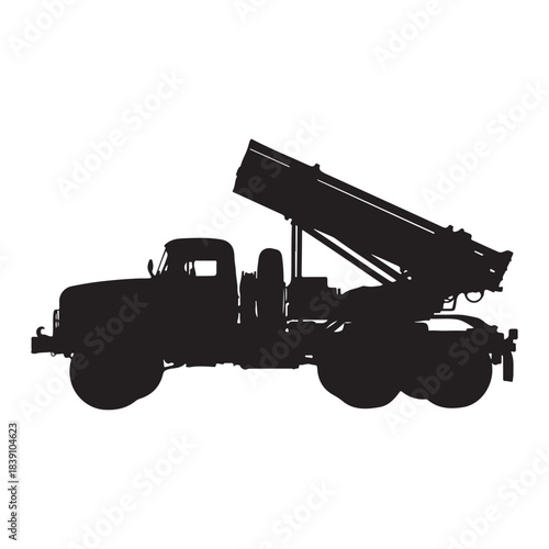This bold black silhouette illustration features a heavy-duty military-style truck equipped with a large mounted launcher system. The strong contrast and clean outline highlight the rugged structure, 