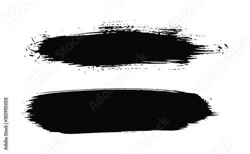 Brash black ink splashes on white background