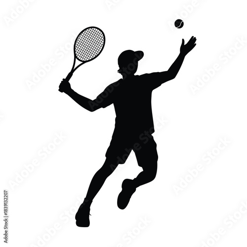 Silhouette of a tennis player serving a ball during a match
