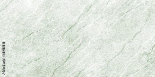 Polished natural granite marble for ceramic wall tiles. soft natural patterns, and a smooth polished stone surface. green paper texture. light green polished plaster rough concrete wall background.