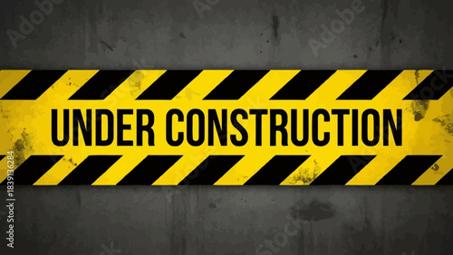 Under Construction Sign: Yellow-Black Diagonal Border with Bold Text on Dark Industrial Background for Website UI and Maintenance Visual Storytelling