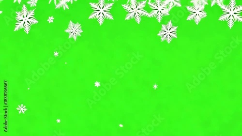 Wallpaper Mural Seamlessly looping animation of large decorative snowflakes creating a border across the top while smaller snowflakes fall, set against a bright green screen (chroma key). Torontodigital.ca