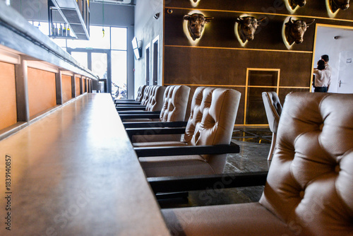 restaurant interior long bar area with seating