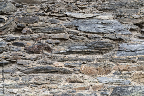 Natural layered stone wall texture