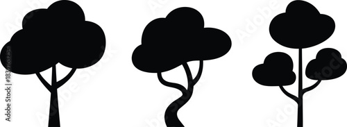 Simple black silhouette illustration of three different shaped trees
