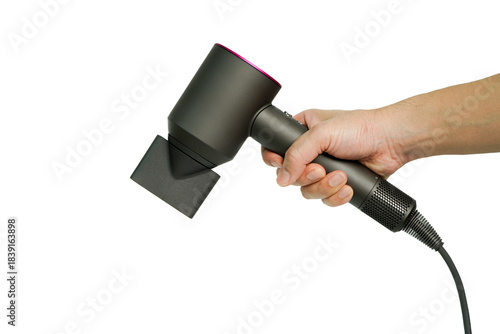 Hair dryer in hand isolated on white background, clipping path