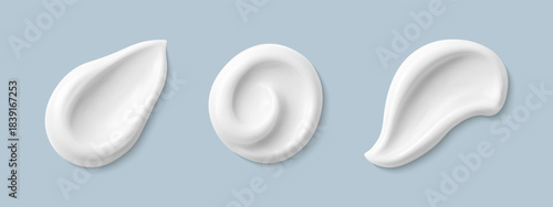 Cosmetic smears of creamy texture isolated on blue background. Set of cosmetic cream swatches. Cosmetic skin care product. Vector realistic illustration