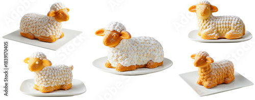Traditional Easter lamb cakes decorated with powdered sugar and festive details, symbolic Paschal dessert arrangement isolated on white background