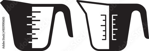 Two black and white measuring cups with volume markings