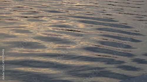 sunset reflection on lake water waves abstract pattern background video