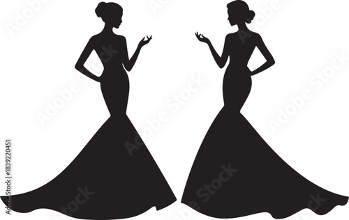 Two elegant women in flowing gowns silhouette