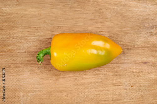 Autumn harvest, vegetables and fruits lie on a wooden table.