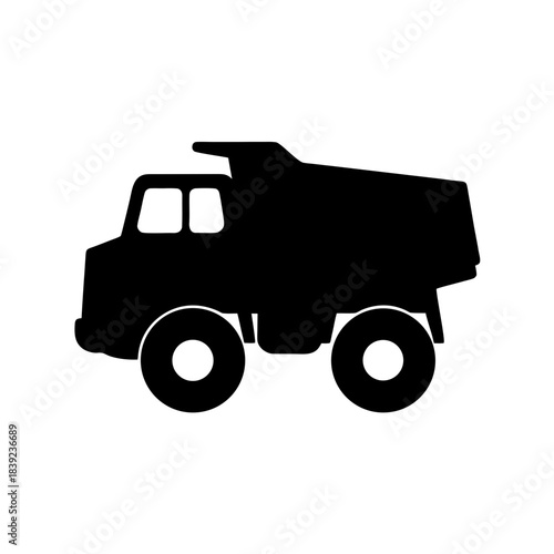 Silhouette of a heavy duty dump truck with loaded bed ready for construction site