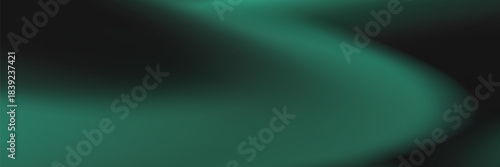 Abstract background with soft green light on a dark backdrop. Noisy green gradient and blurred background texture for modern design.