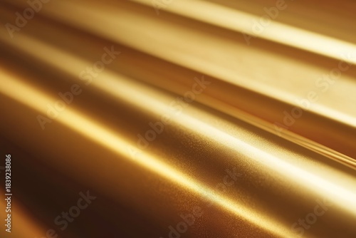 Shiny gold metallic background with a smooth texture suitable for various design applications