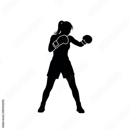 Female boxer silhouette in fighting stance ready for action.