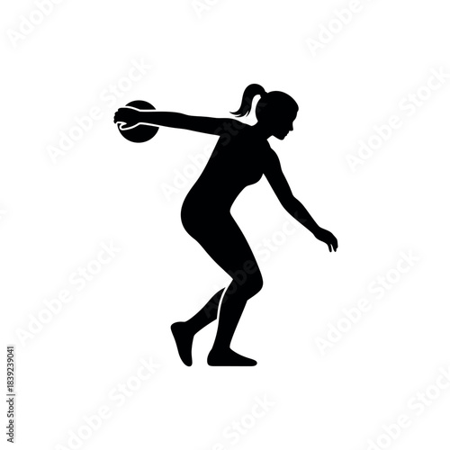 Silhouette of a Woman Discus Thrower in Action.