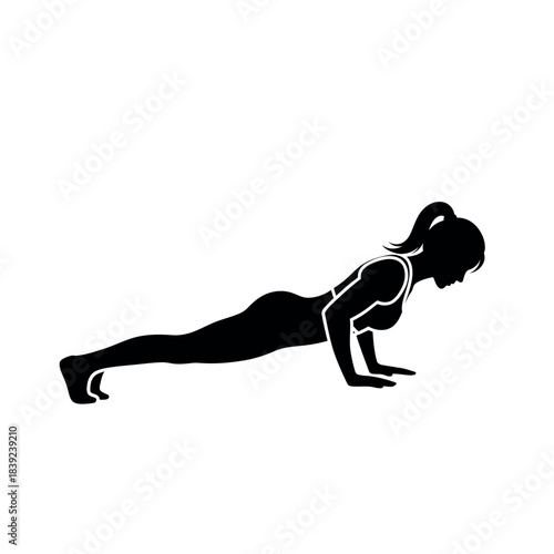 Silhouette of a woman performing a pushup exercise.