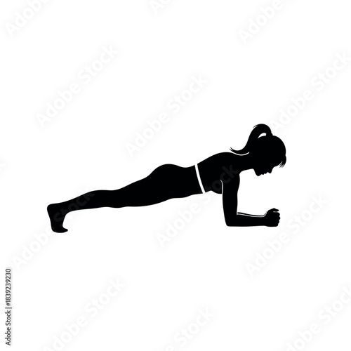 Silhouette of a woman performing a plank exercise.