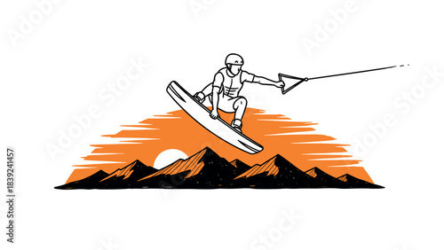 Dynamic wakeboarder performing jump against vibrant mountain sunset scene
